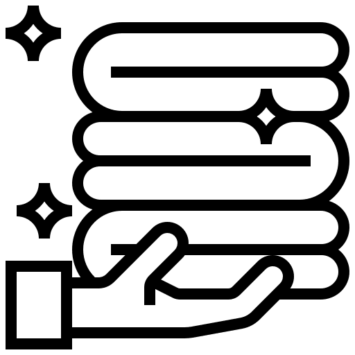 A person sits with legs crossed, working on a laptop. Various symbols, such as a lightbulb and gears, float above, representing ideas and productivity.